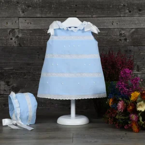 Vestido de lino con entredoses de tira bordada
