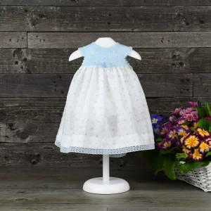 Vestido tipo jesusito en plumeti estampado con canesú en punto